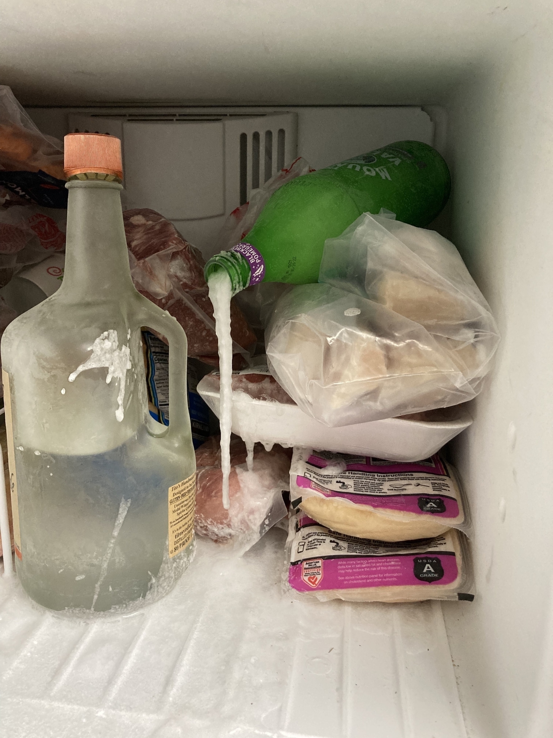 Exploded water bottle in freezer. 