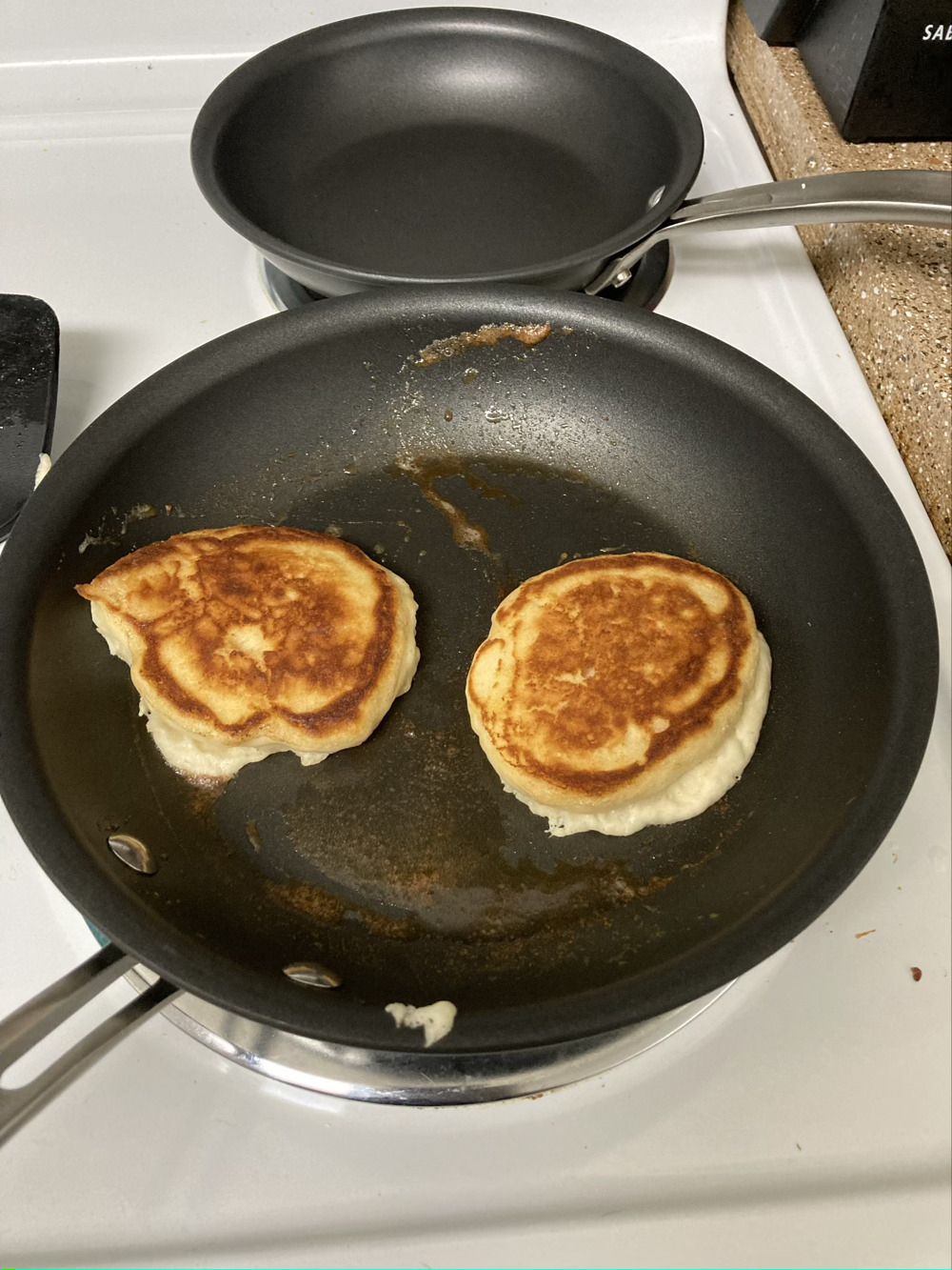 Pancakes in a skillet. 